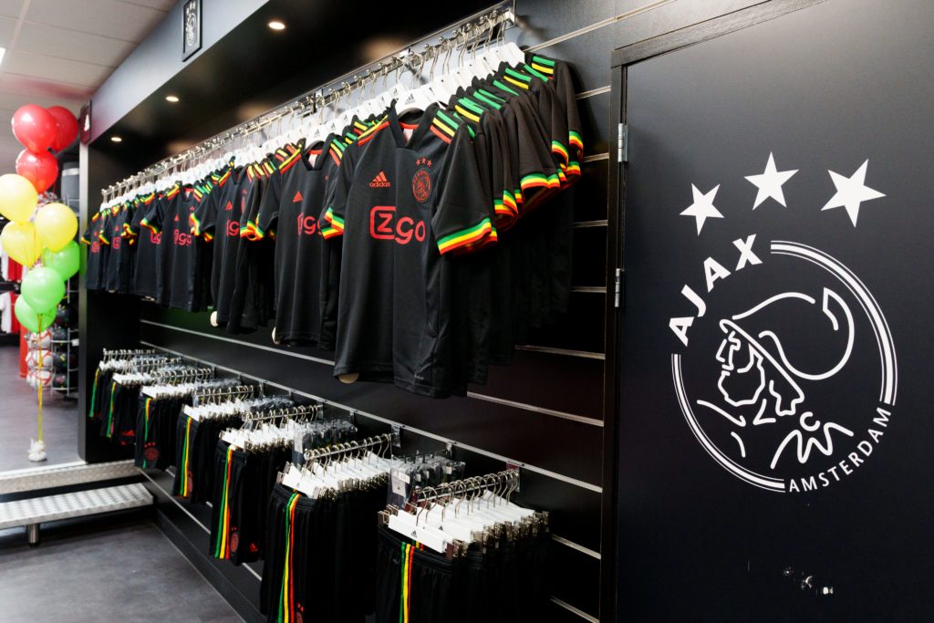 Ajax fans queue for third jersey