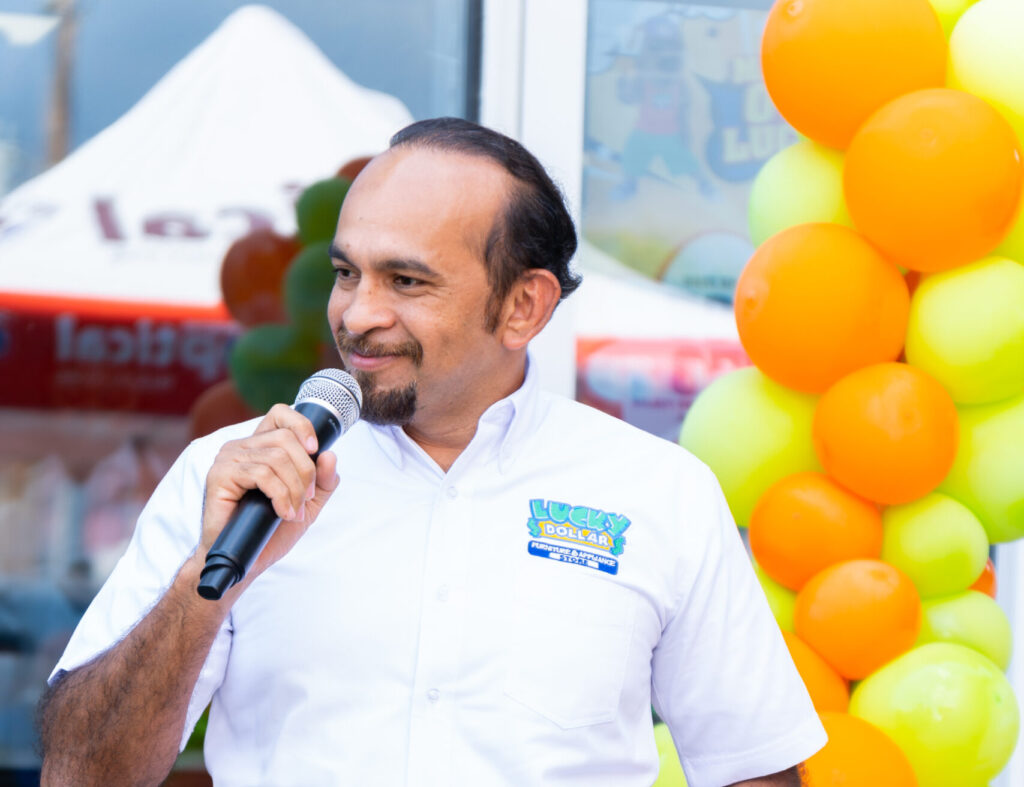 Unicomer Group Managing Director Edwin Vaquerano welcomes customers to the newly opened Lucky Dollar location at 24 South Street, Old Harbour St. Catherine. (Contributed photo)
