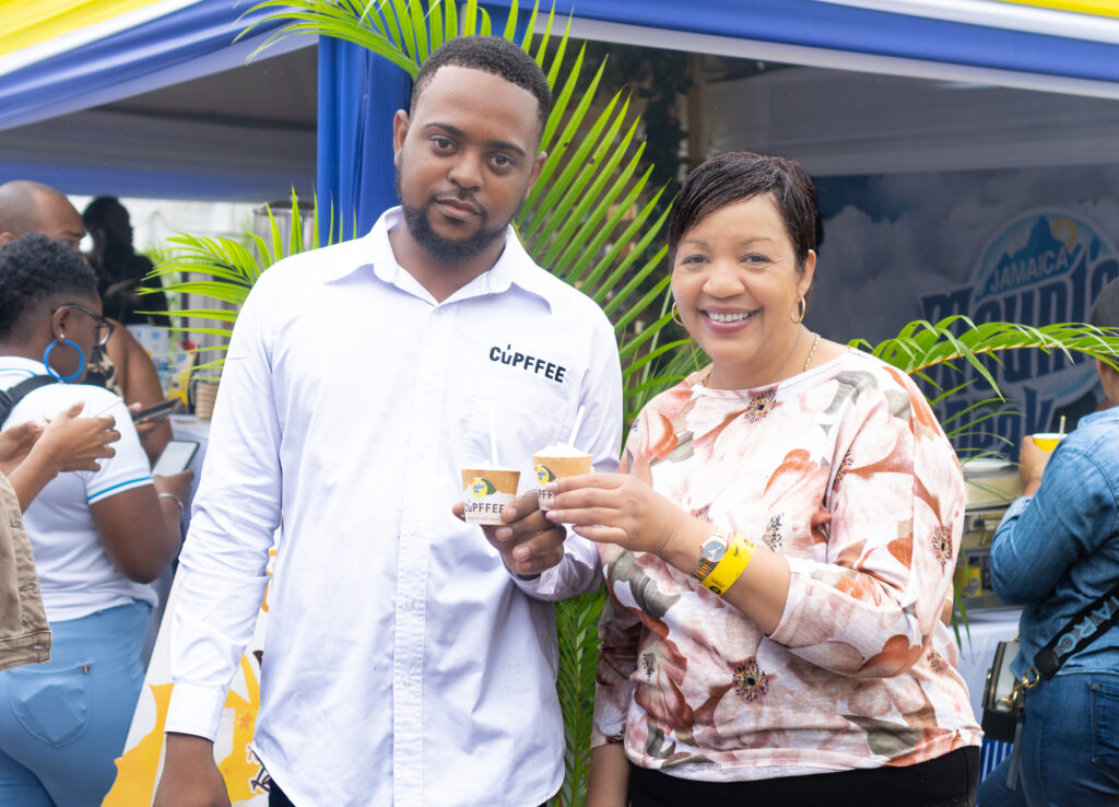 Distributor of Cupffee edible cups, Duvaughn Morris (left), and Kerrian Johnson, Commercial and Corporate Affairs Manager at Salada Foods, started the day on the right note as they raised their cups of Jamaica Mountain Peak Roasted and Ground coffee in a toast. (Photo: Contributed)