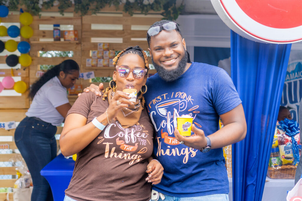 Yolande Smith (left) and Rolando McDonald savoured a day of coffee treats and eats during the Jamaica Blue Mountain Coffee Festival held at the Newcastle Parade Grounds on Saturday, March 2, 2024 held at the Newcastle Parade Grounds.  (Photo: Contributed)