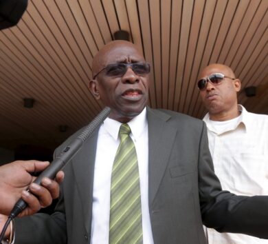 FILE PHOTO: Warner talks to the media outside Hall of Justice in the capital Port-of-Spain